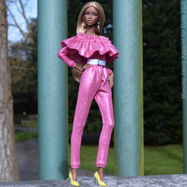 Ruffle jumpsuit with side pockets and belt