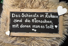 Schild quer "Das Schönste an Zuhause sind die Menschen, mit denen es man teilt"