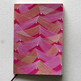 Carnet grandes ailes d'oiseaux or fond rouge