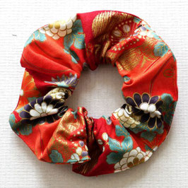 Chouchou fleuri fleuri fond orange et or
