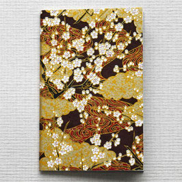 Carnet de poche avec lignes branches de fleurs de cerisiers fond or