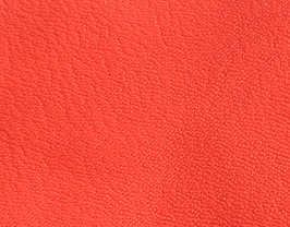 Coupon de cuir de chèvre rouge corail