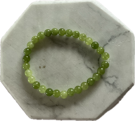 Peridot Olivin Kugelarmband, 6 mm Kugeln, Länge 19 cm lang, elastisches Stretchband - ohne Deko