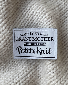 Label "Made by my dear grandmother - with help from PetiteKnit", PetiteKnit