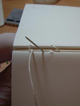 Fabrication d'un petit carnet en tissu, reliure à la française
