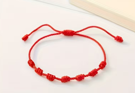 Pulsera hilo rojo budistas 7 nudos