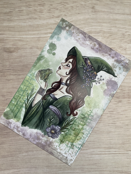 carte postale "le grimoire des sorcières" sorcière verte