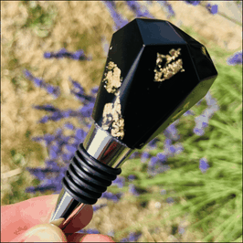 BOUCHON DE BOUTEILLE EN RÉSINE NOIRE AVEC INCRUSTATIONS DE FEUILLES DORÉES
