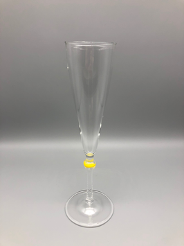 CHAMPAGNE GLASS WITH YELLOW SPOT