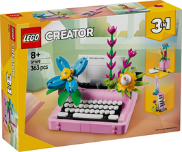 31169  Typemachine met bloemen