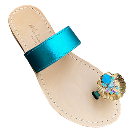Sandali infradito con fascia alluce "conchiglia" colore turchese laminato.