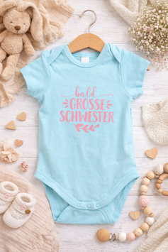 Kurzarm Body bald grosse Schwester rosa glitzer auf türkis 98