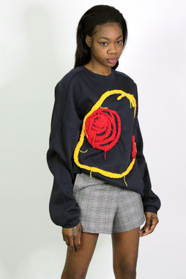 women wearing shorts and sweater