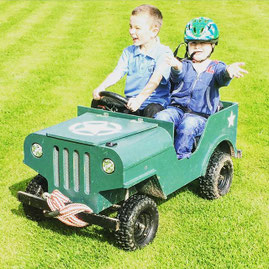 Handmade electric jeep built for outdoor play and garden adventures