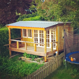 Summer house and garden retreat built from reclaimed timber in rural Scotland