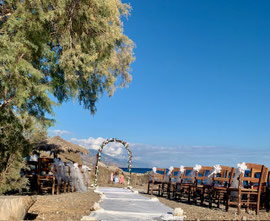 decorated chairs on beach