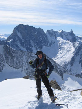 Chrissi posing on the summit of Les Courtes.