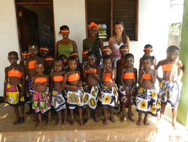 Care giver's day: Stella Bili, project coordinator of KARIBU care, with the teachers and the children of the school