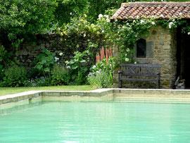 Stone walled swimming pool, Chateau de Tennessus castle