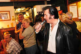 pub singing / courtesy of Photplibrary Wales