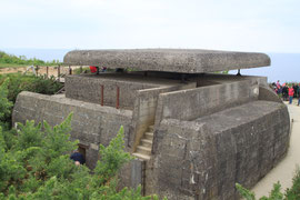 This bunker in the network of the Longue-sur-mer battery was used in "The Longest Day" as Pluskat's bunker. 