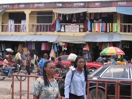 This is the marketplace where we buy our fine West African cloth. The sign says 'the epitome of peace.'