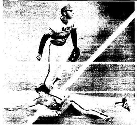 Pete Rose slides safely into third during the first inning.