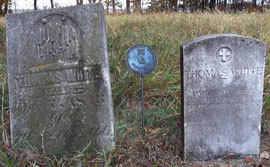 The family headstone (left) and government marker (right) for Thomas White, veteran of the Revolutionary War with the Macomb DAR medallion between them.