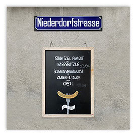 StadtSicht 172c: Restaurant-Menütafel in der Niederdorfstrasse