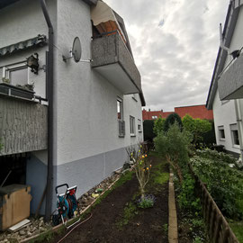 Fassade vor der Renovierung. 