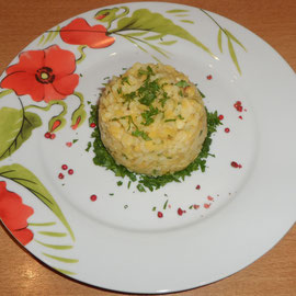 Risotto - mit Hilfe eines Garnierringes schön angerichtet
