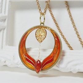 Pendentif Renaissance symbolisant un phénix orange et son oeuf doré