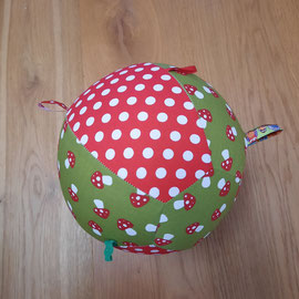 Luftballonhülle mit Bändern, grün-rot mit Pilzen