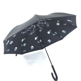Parapluie avec double toile unie noire à l'extérieur et imprimée sur toute la surface à l'intérieur