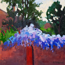 Roses and Wisteria, 12 x 9 inches, oil on panel  Image description: Impressionistic painting of a brick wall with a red door covered in overhanging purple and blue wisteria and red roses. There are trees and houses in the background.