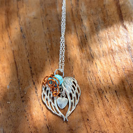 9. Hrudaya pendant/amulet - Copper blue and silver wings. Connected to Kyro. £35