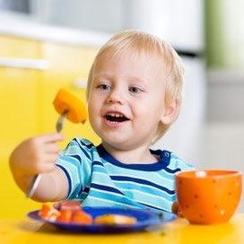 Child feeding himself SOS Feeding Method