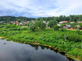 View of Krslava from bridge over Daugava River with green zone at water's edge