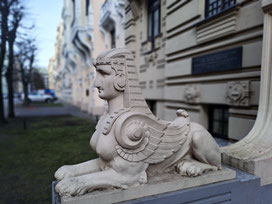 Sphinx in front of anArt Nouveau building on Riga's Alberta iela