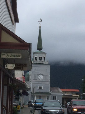 Sitka. Old Harbor Books and two bald eagles perched on the church.