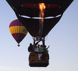 Adventure Tours Travelers Waving from the Balloon