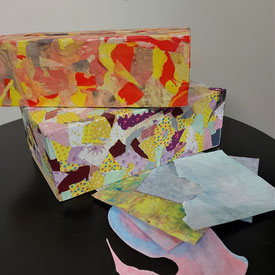 Boîtes décorées avec des chutes de papiers récupérés