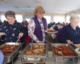 Ladies serving themselves from the buffet line at Terrazza's Restaurant