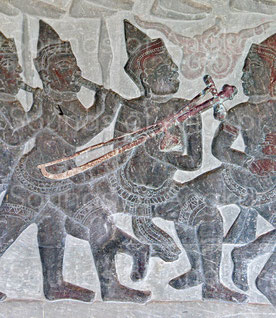 3. The only representation of a zither with its string and tuning peg. According it size and shape, the resonator could be a coconut. Angkor Wat, north gallery. 16th century.