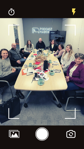 Workshopteilnehmer in Konferenzraum