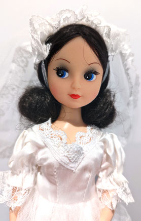 Bride's Happiness Fleur with Tennisstar facemold and strong exeshadow and blushing, typical for this doll.