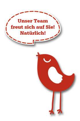 Der Wohnnatur-Vogel ist abgebildet. Er sagt: Unser Team freut sich auf Sie! Natürlich!