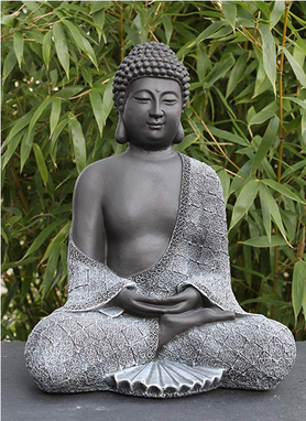 Buddha Stein Statue sitzend in Garten