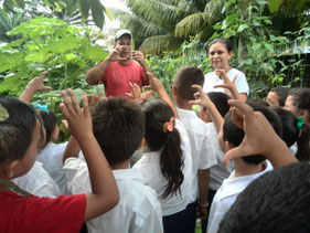 Children are learning about what is "Okura" vegetable.