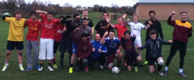 Mark with players from Bradford Academy